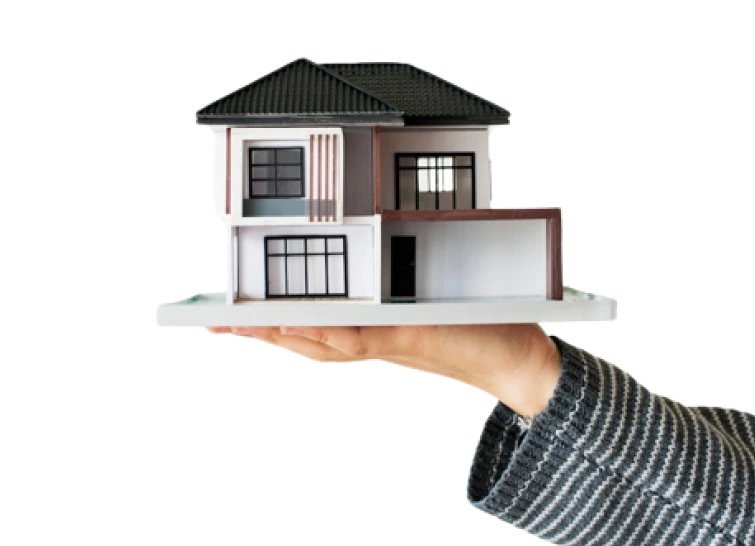 Modern house held in hand